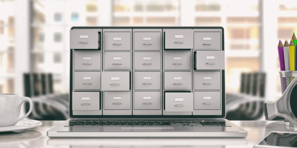 Laptop displaying filing cabinet drawers